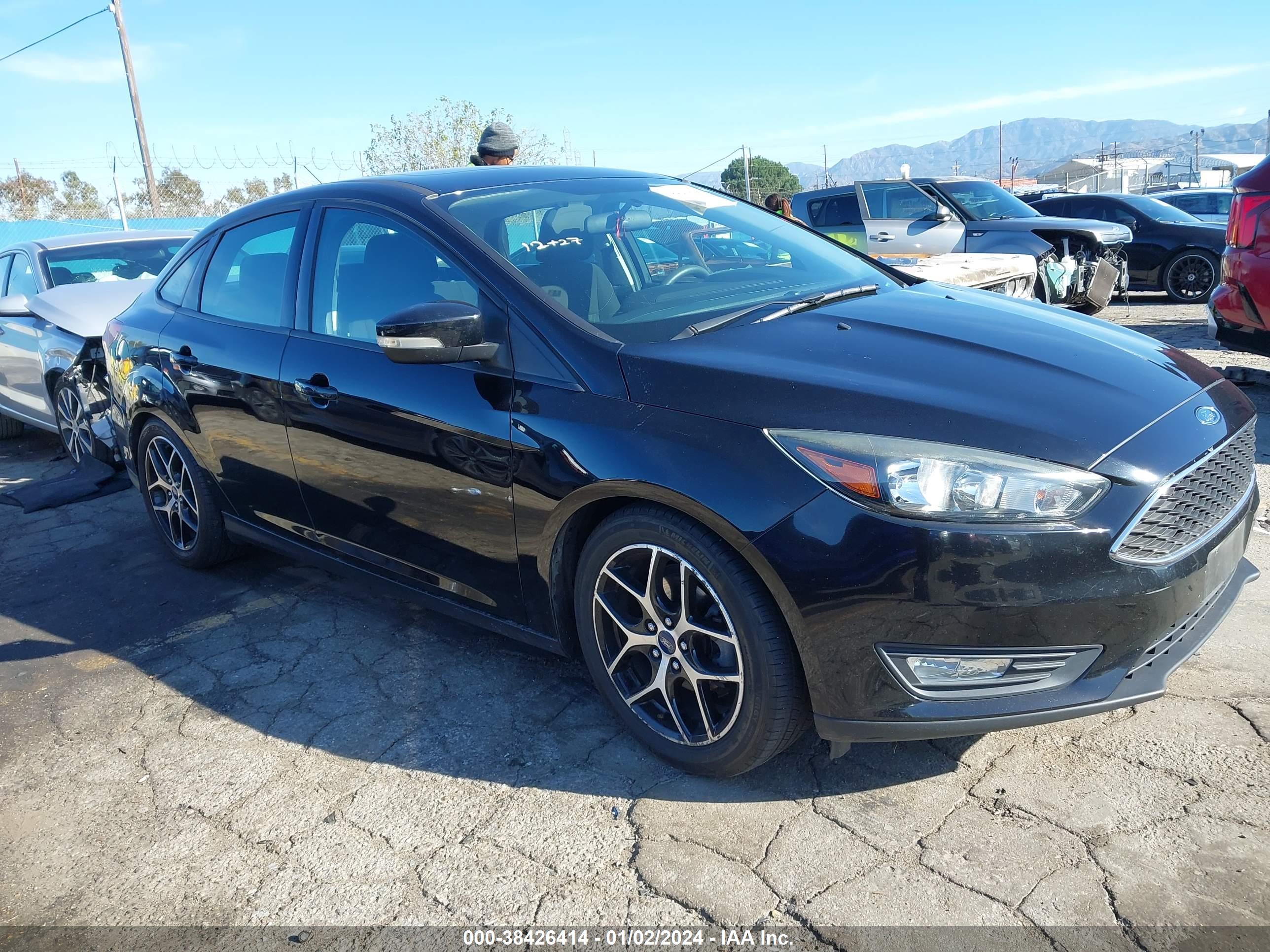 2017 FORD FOCUS — VIN 1FADP3H22HL245564 — photo 1 of 15