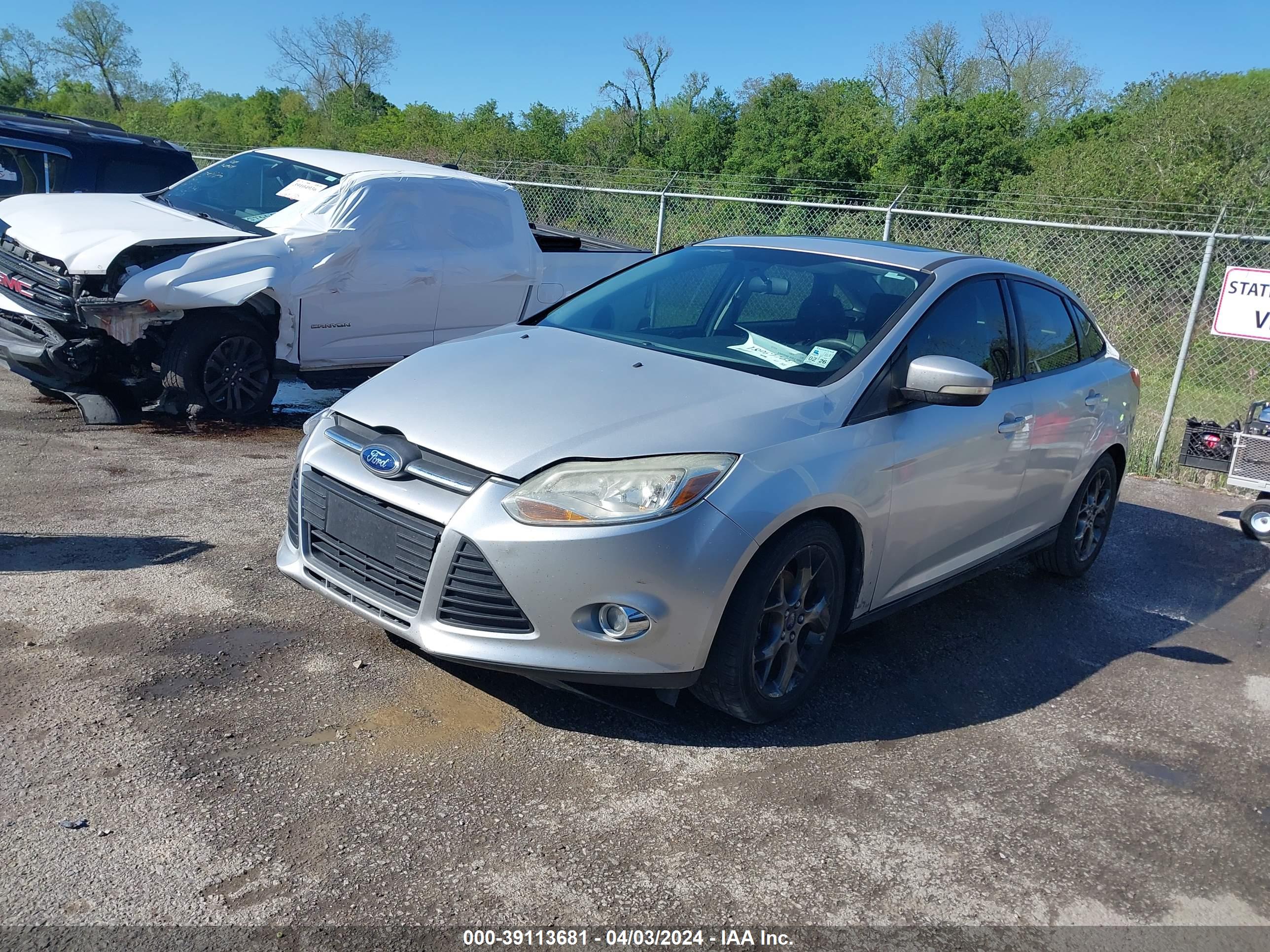 2013 FORD FOCUS — VIN 1FADP3F21DL354384 — photo 2