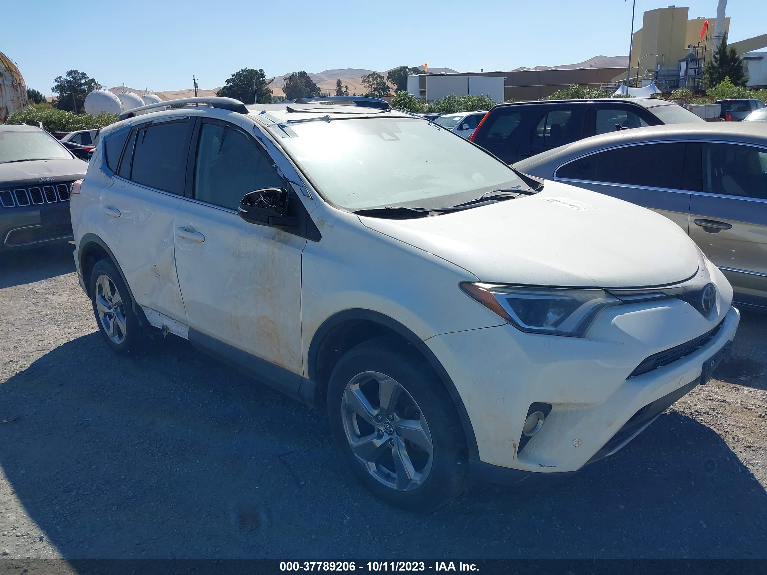 2017 TOYOTA RAV4 — VIN JTMWFREV6HJ101311 — photo 1 of 15