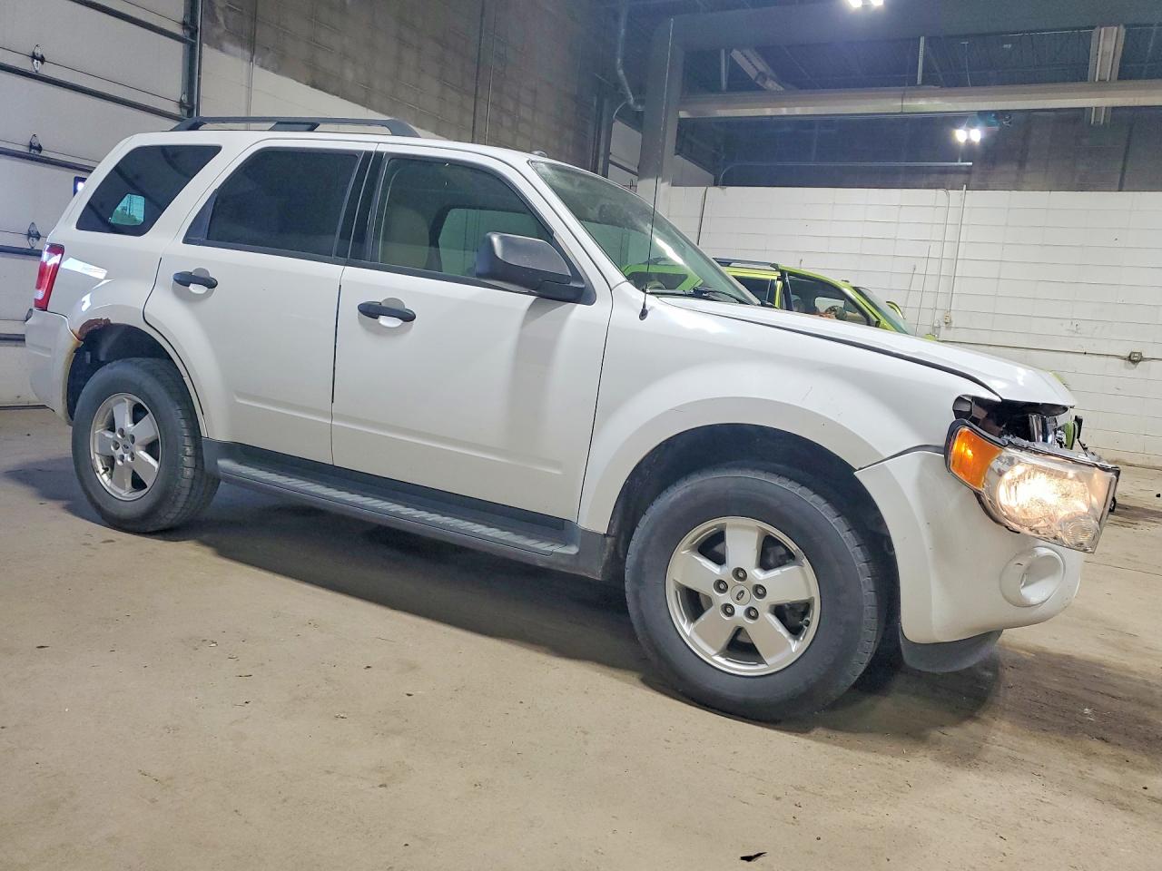 2011 FORD Escape — VIN 1FMCU0D73BKA93558 — photo 4
