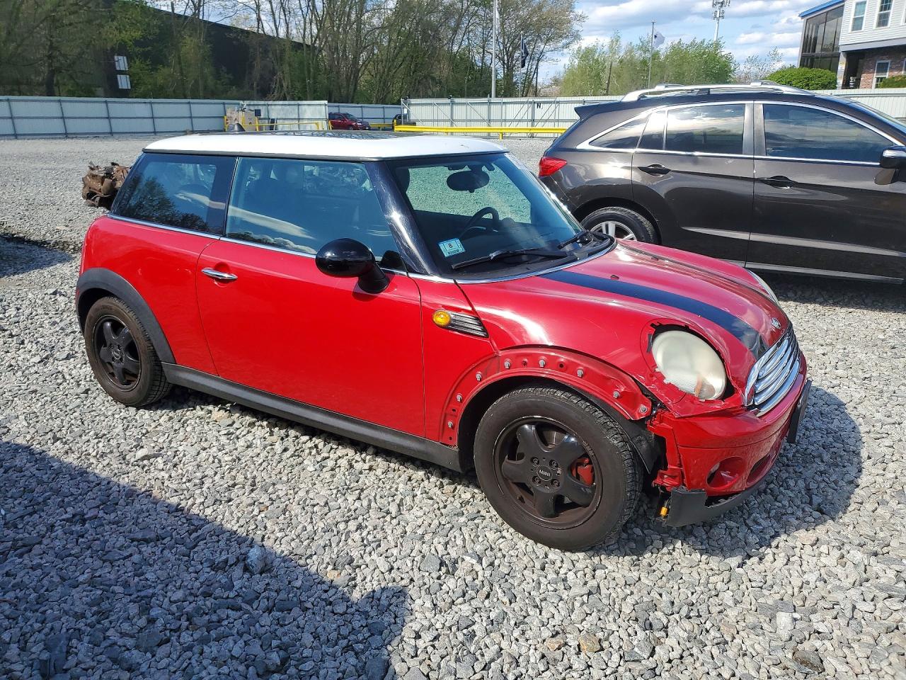 2009 MINI Cooper — VIN WMWMF33549TW79627 — photo 4
