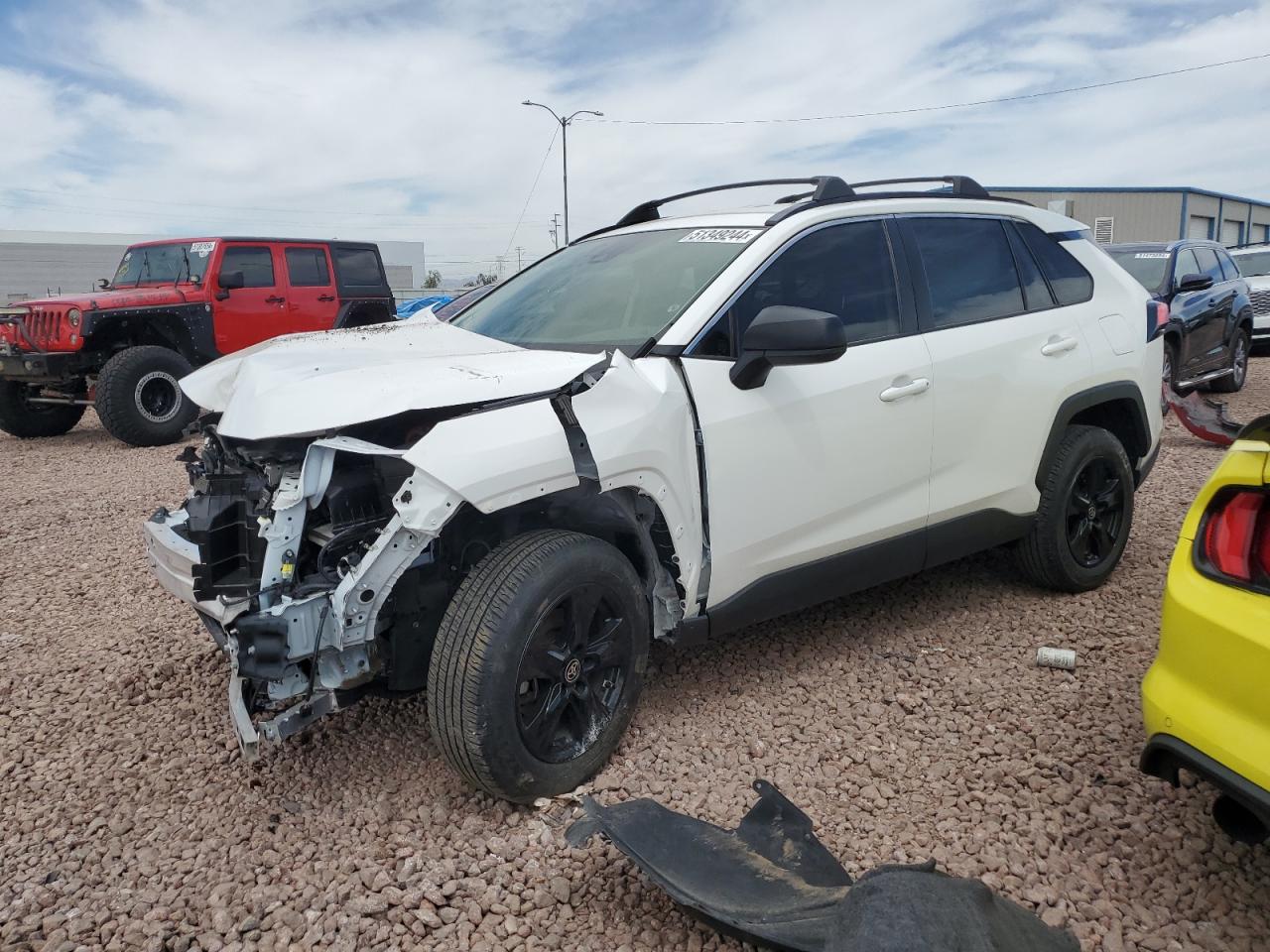 2022 TOYOTA RAV4 LE — VIN JTMLWRFV1ND153411 — photo 1 of 13