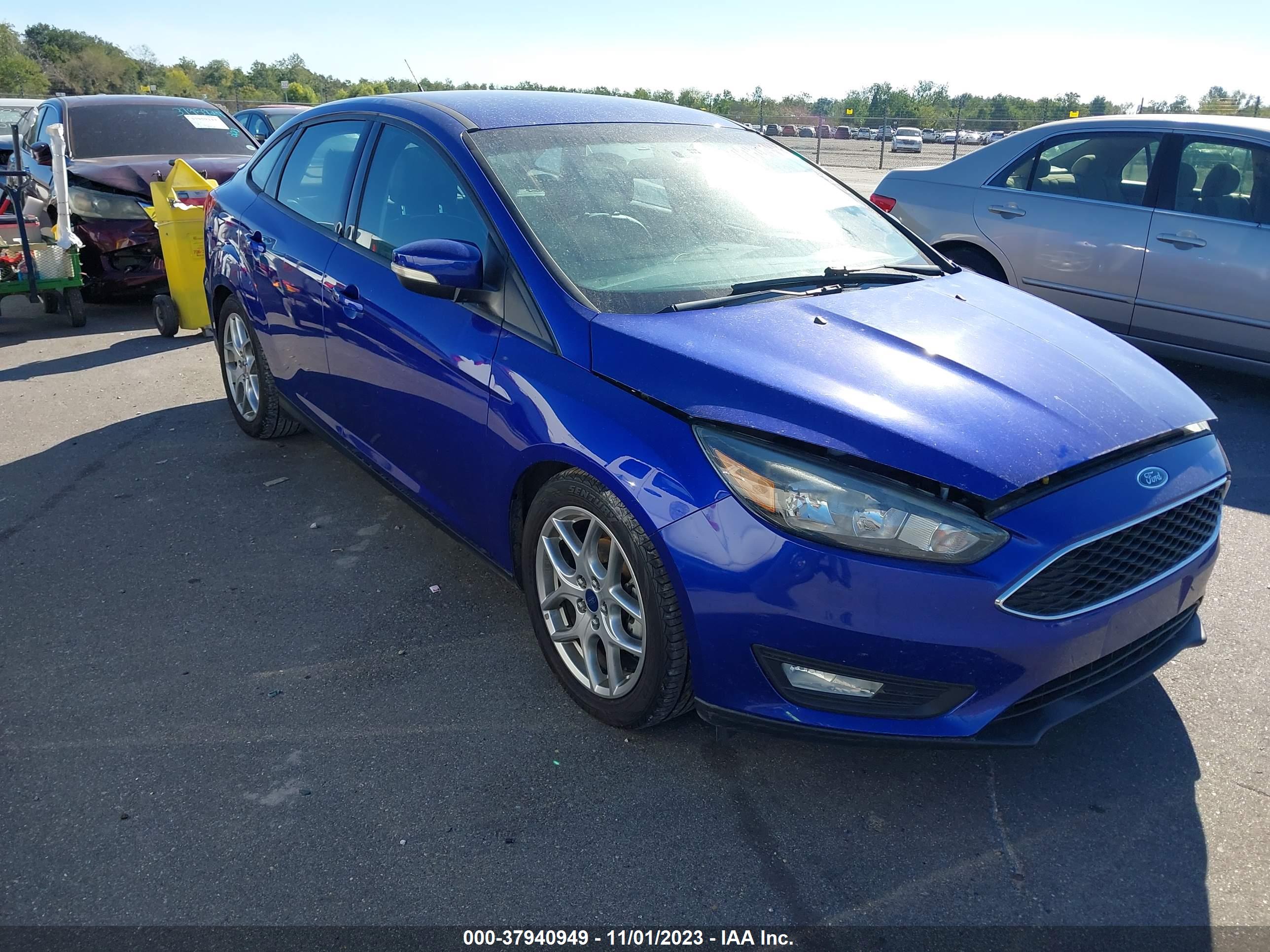 2015 FORD Focus — VIN 1FADP3F2XFL357044 — photo 1 of 16