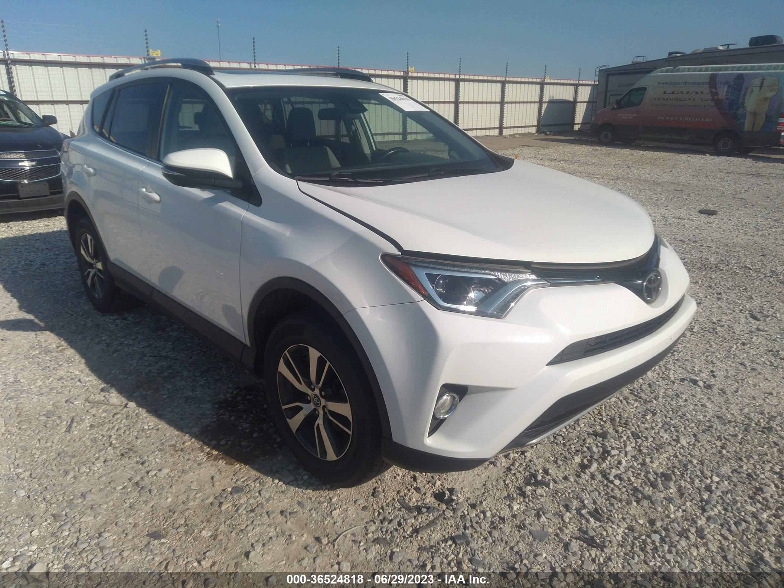 2017 TOYOTA RAV4 — VIN JTMWFREV8HJ116392 — photo 1 of 16