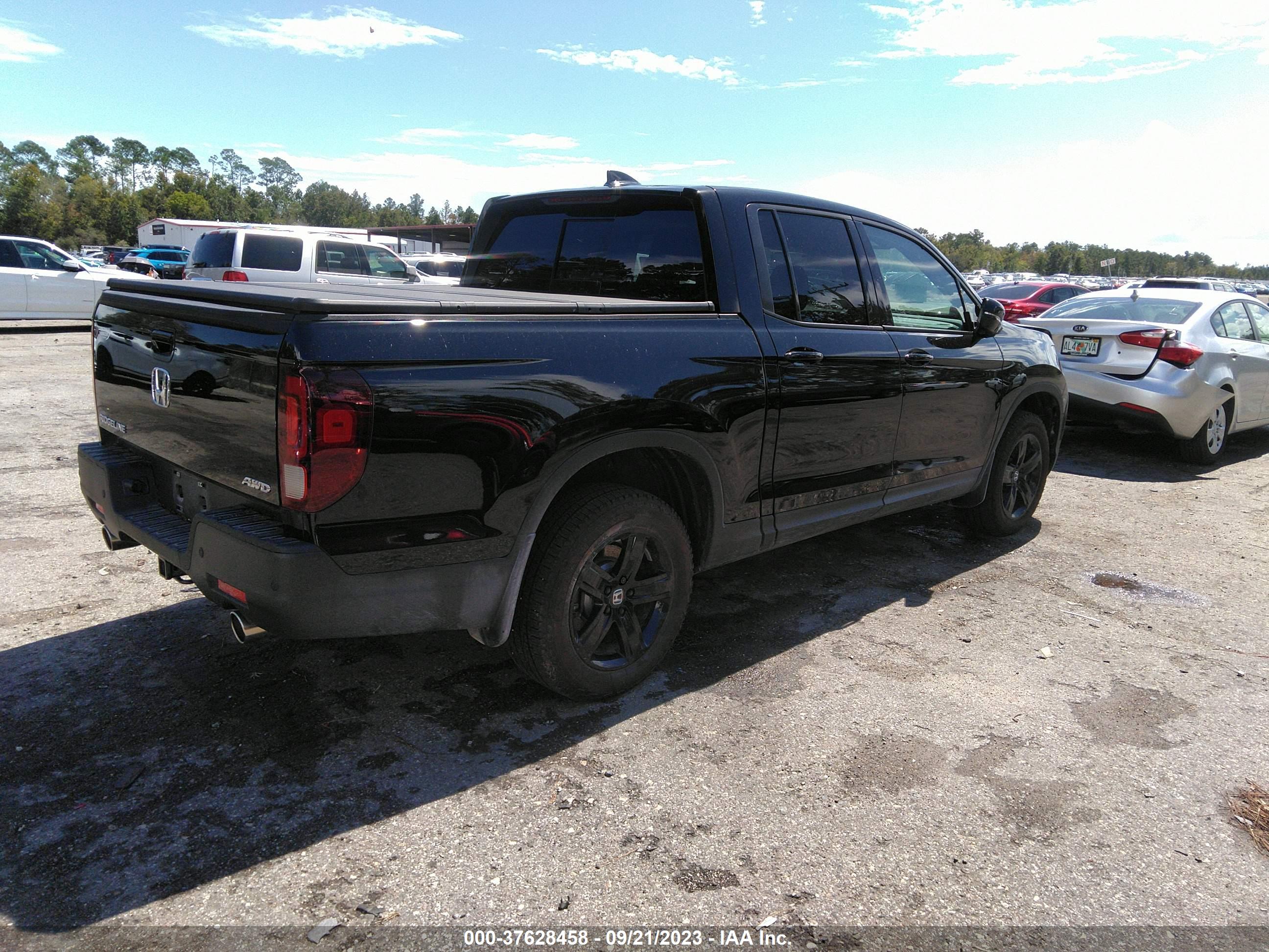 2023 HONDA RIDGELINE — VIN 5FPYK3F87PB027176 — photo 4