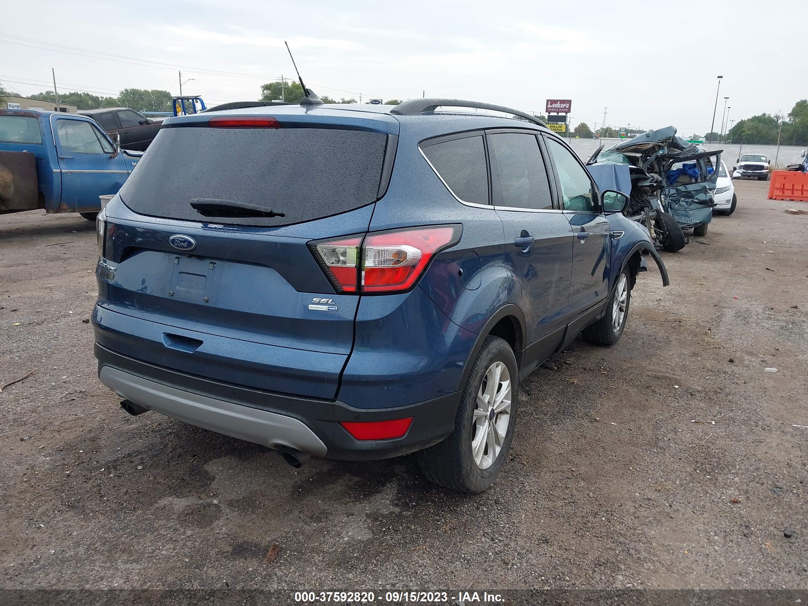 2018 FORD ESCAPE — VIN 1FMCU9HD1JUB83539 — photo 4