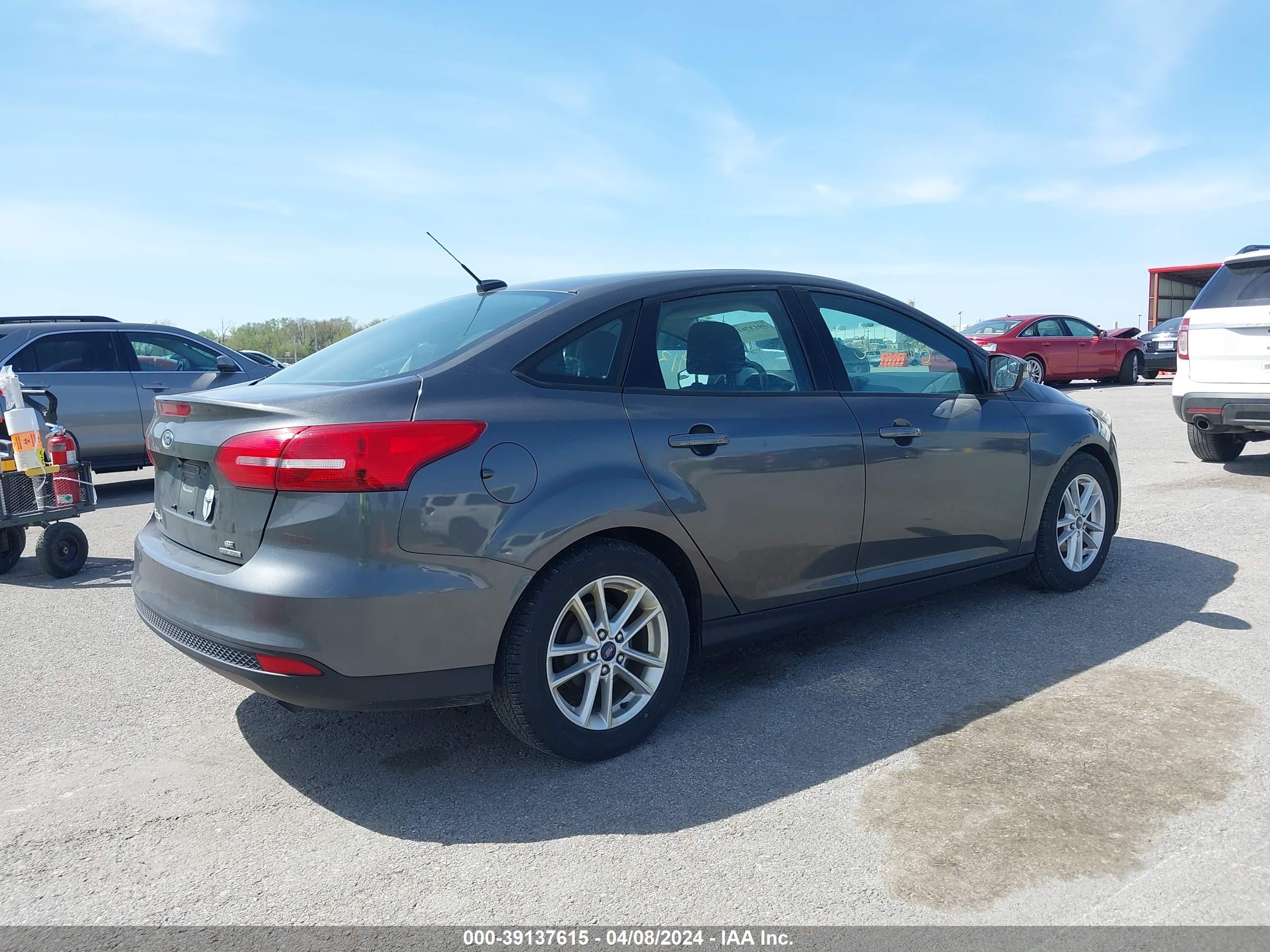 2016 FORD FOCUS — VIN 1FADP3F23GL318331 — photo 4