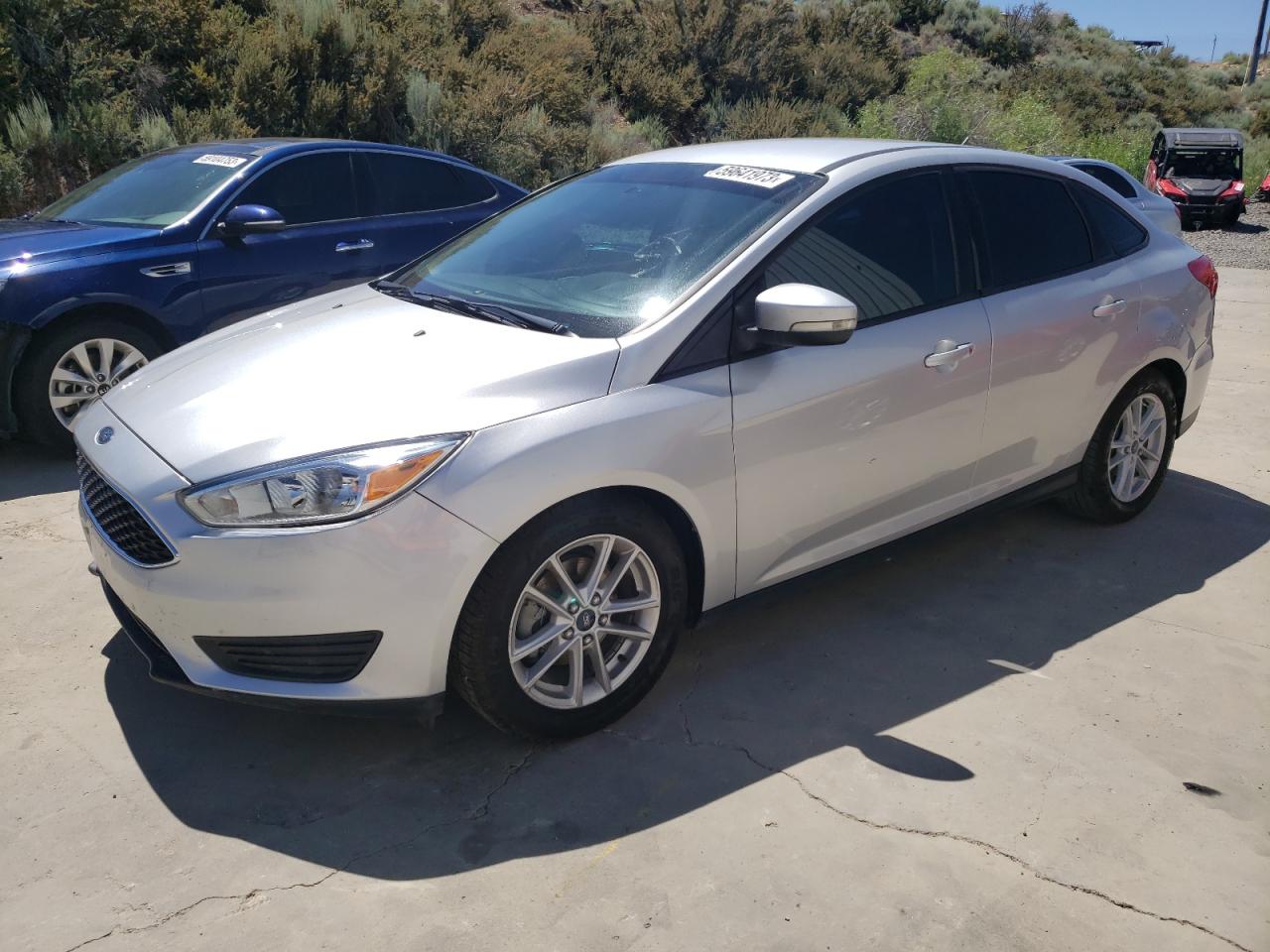 2016 FORD FOCUS SE — VIN 1FADP3F28GL271894 — photo 1 of 12