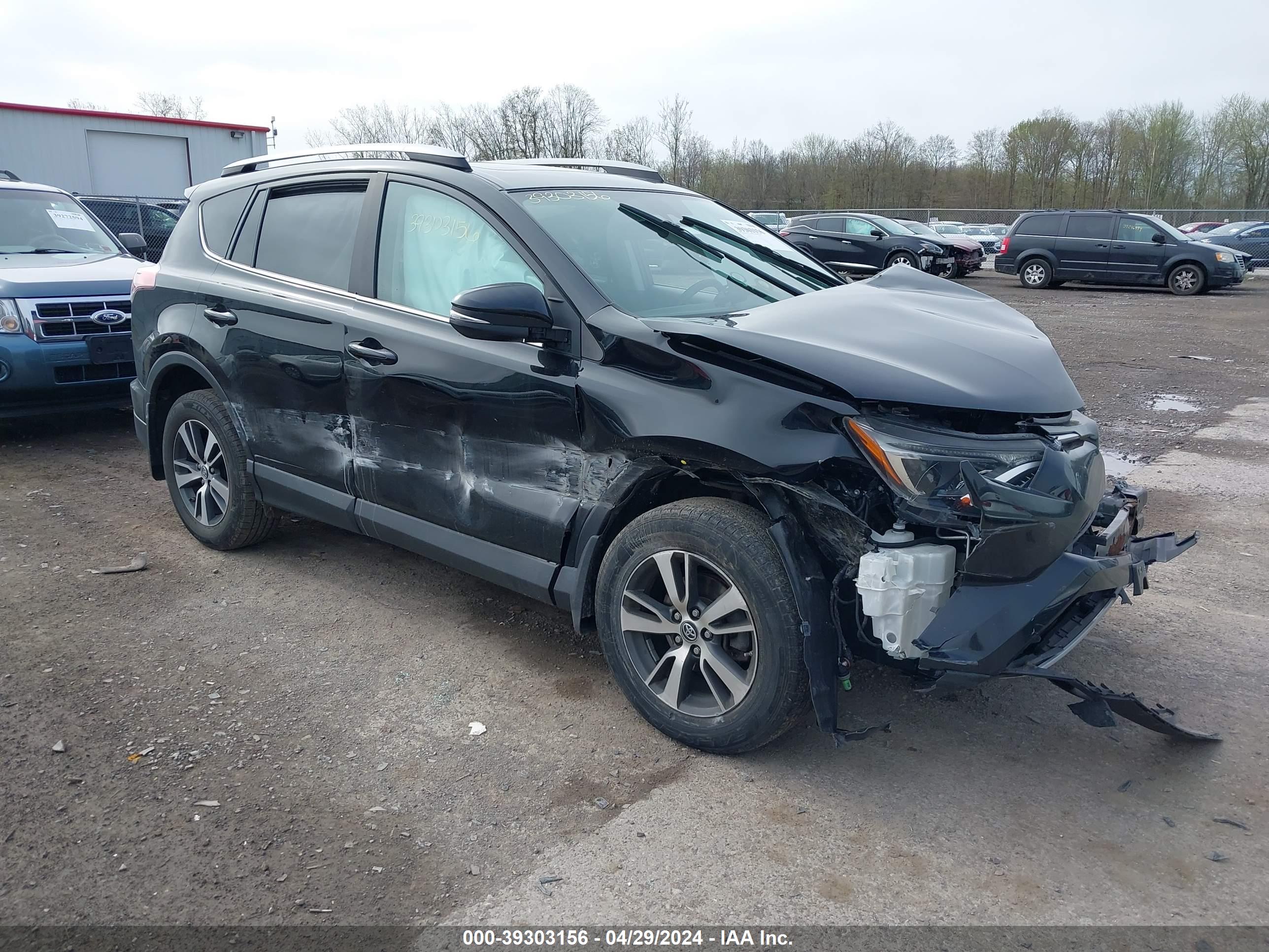 2018 TOYOTA RAV4 — VIN 2T3RFREV7JW781921 — photo 1 of 16
