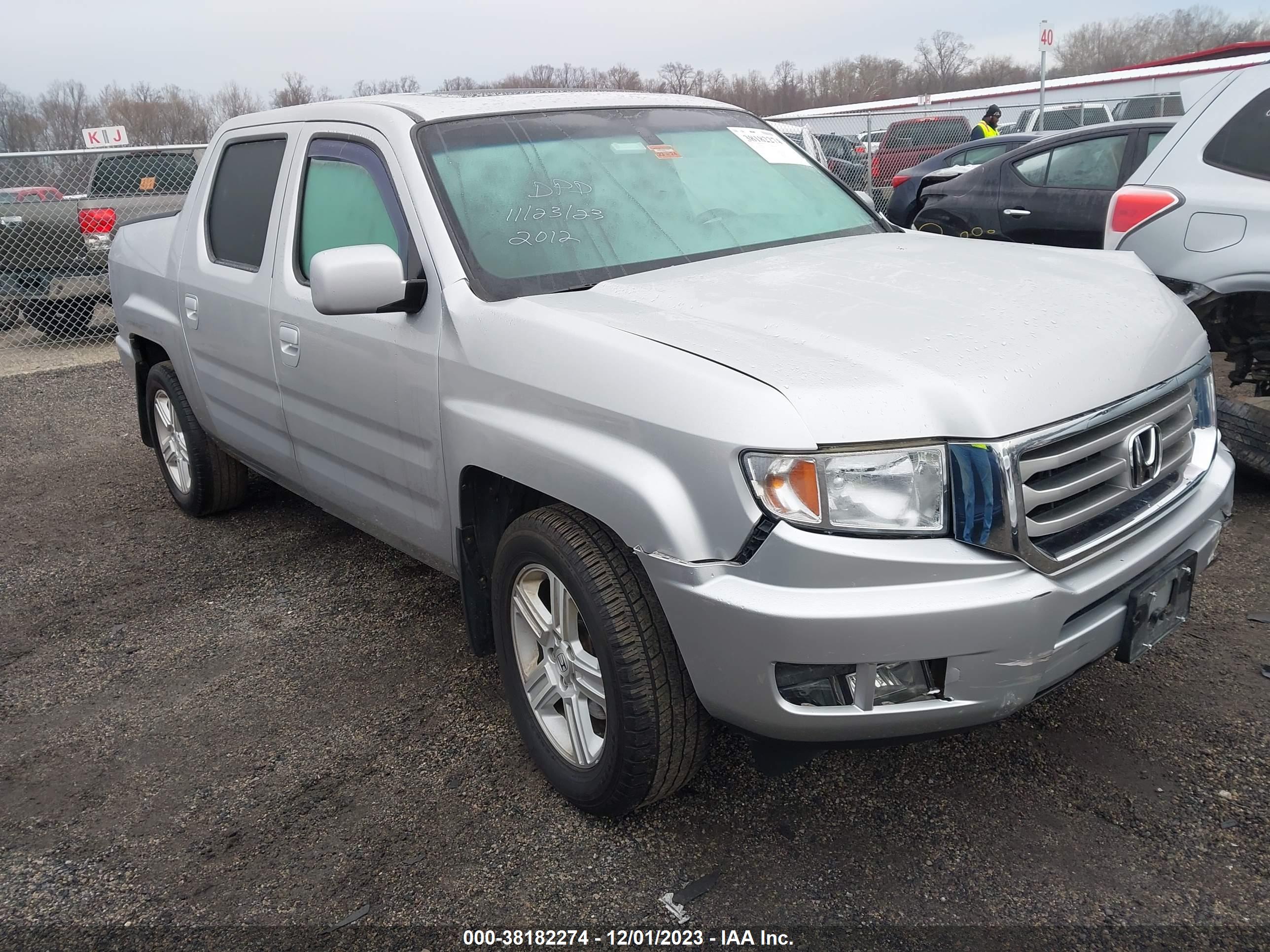 2012 HONDA RIDGELINE — VIN 5FPYK1F50CB002642 — photo 1 of 16