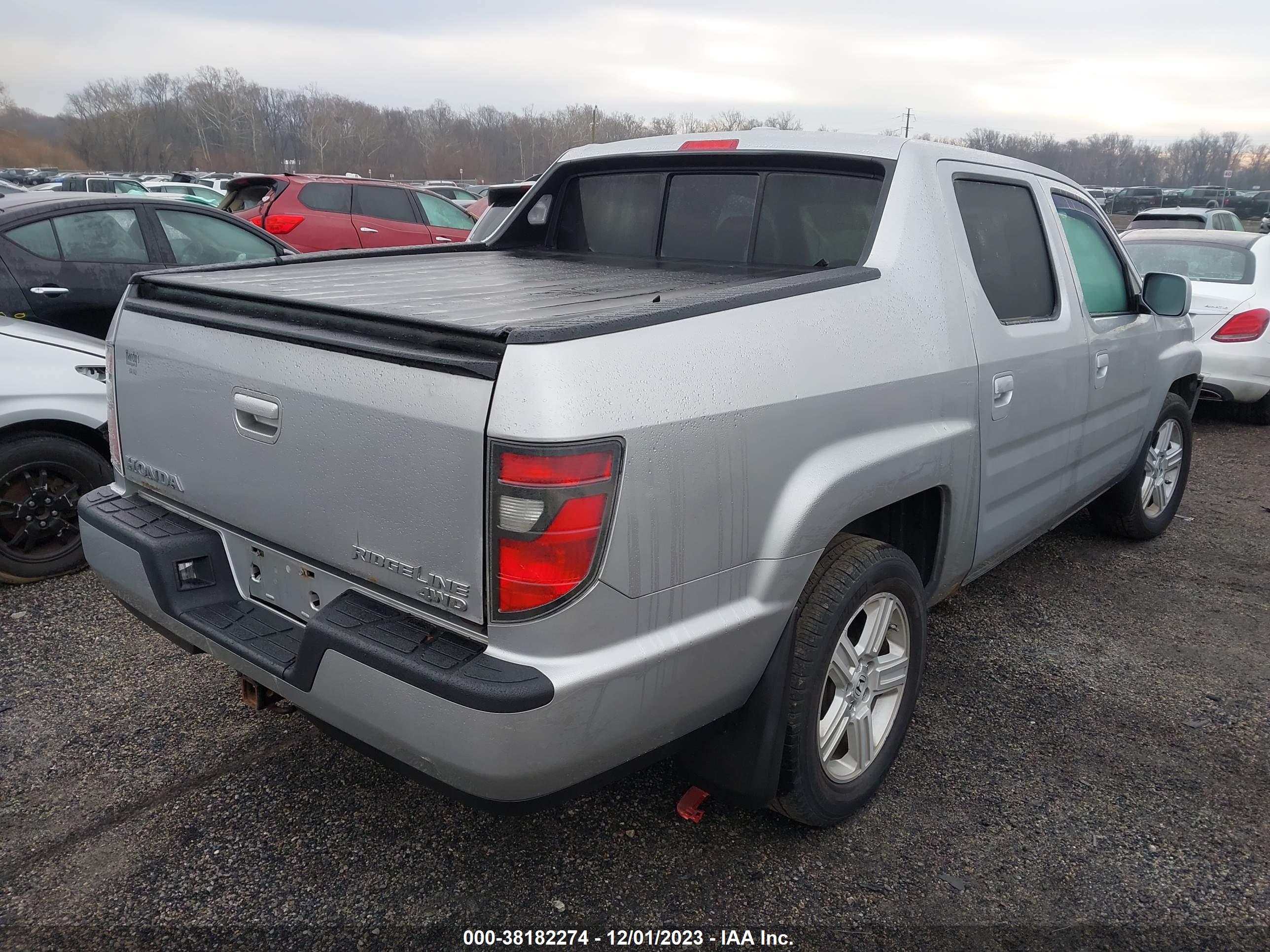 2012 HONDA RIDGELINE — VIN 5FPYK1F50CB002642 — photo 4