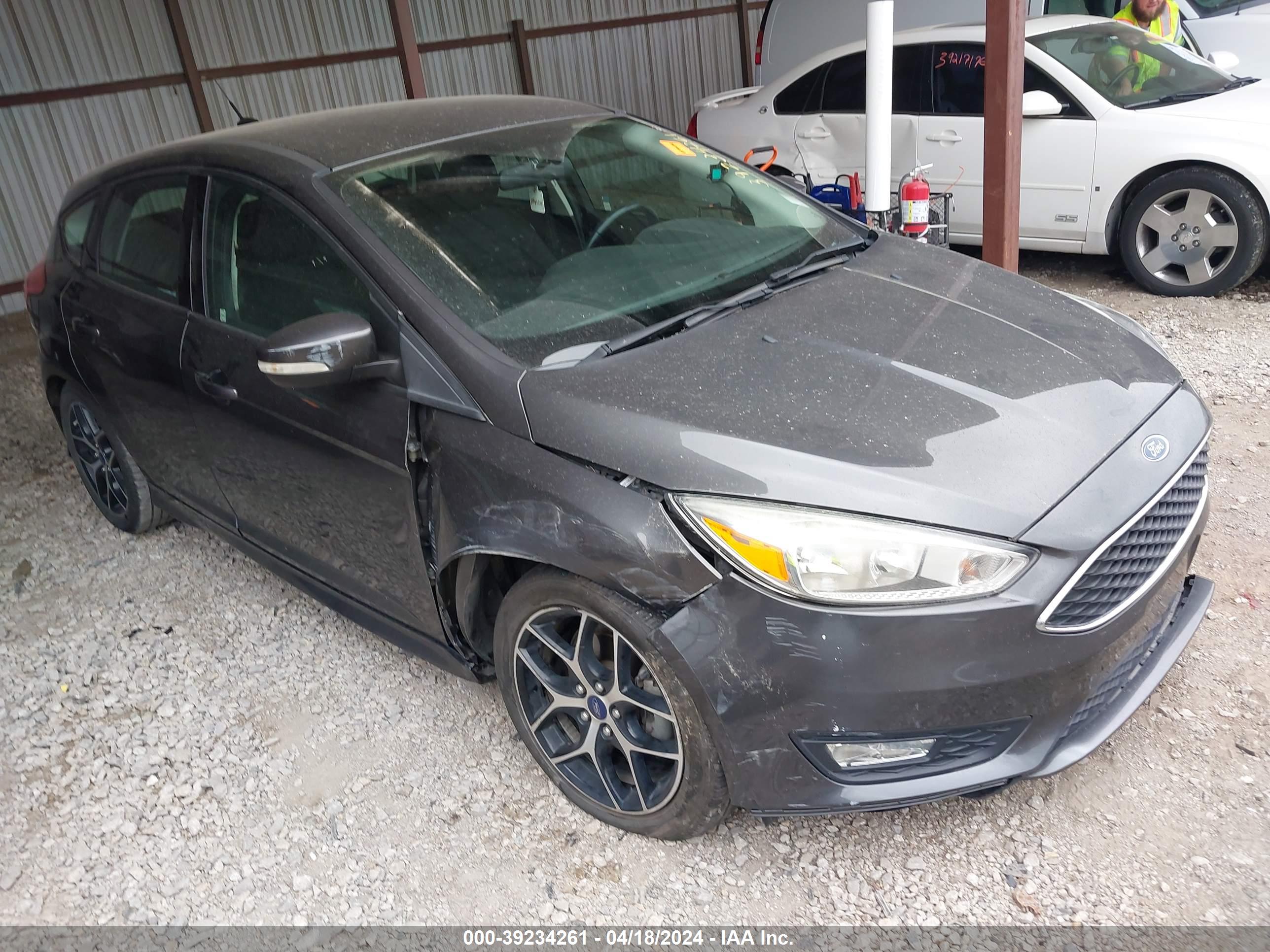 2016 FORD FOCUS — VIN 1FADP3K26GL372602 — photo 1 of 11