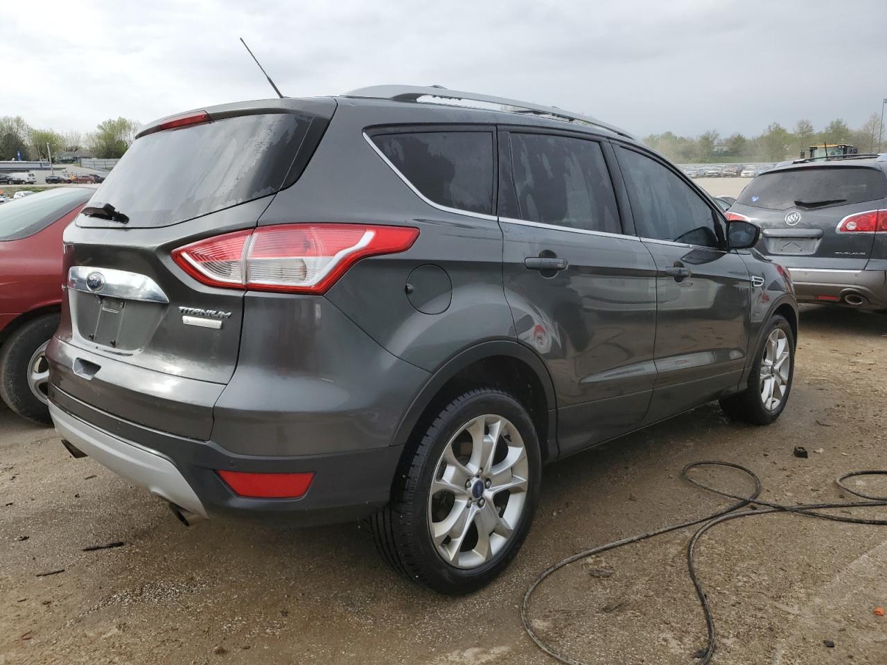 2016 FORD ESCAPE TIT — VIN 1FMCU0JX6GUA97930 — photo 3