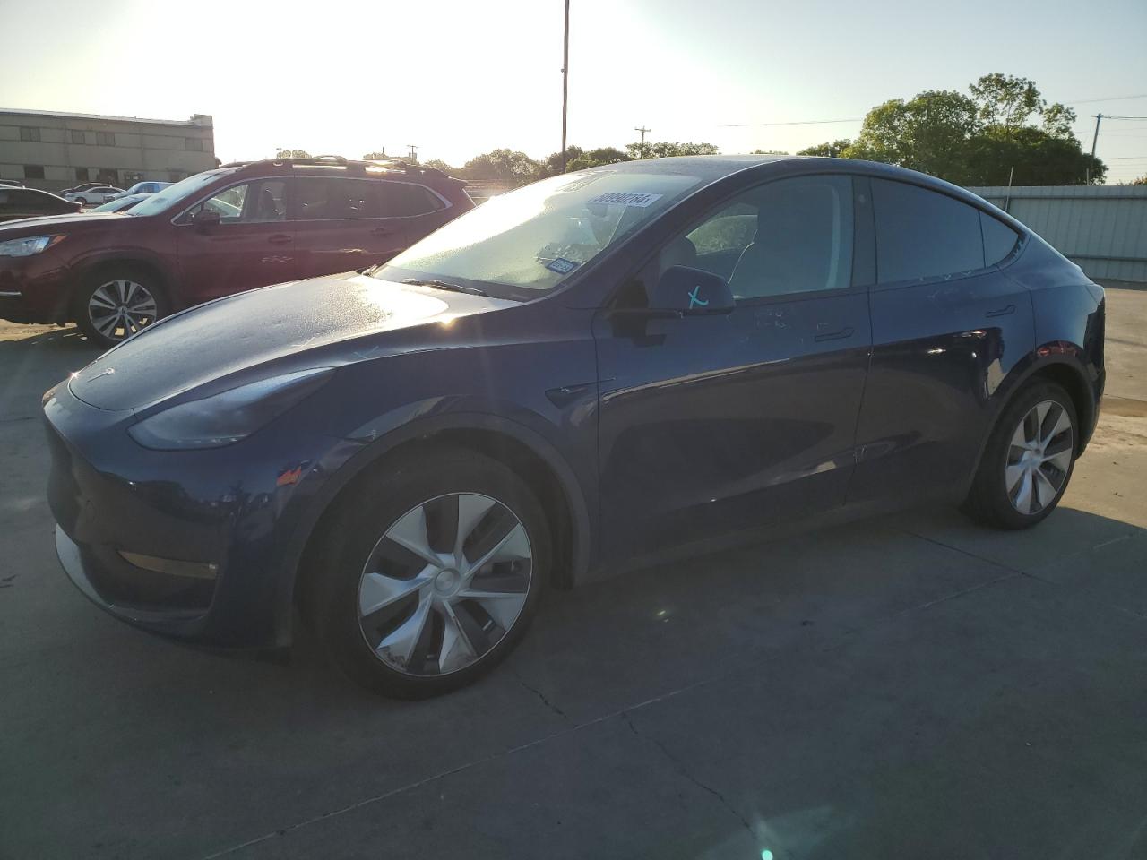 2023 TESLA MODEL Y — VIN 7SAYGAEE4PF704032 — photo 1 of 12